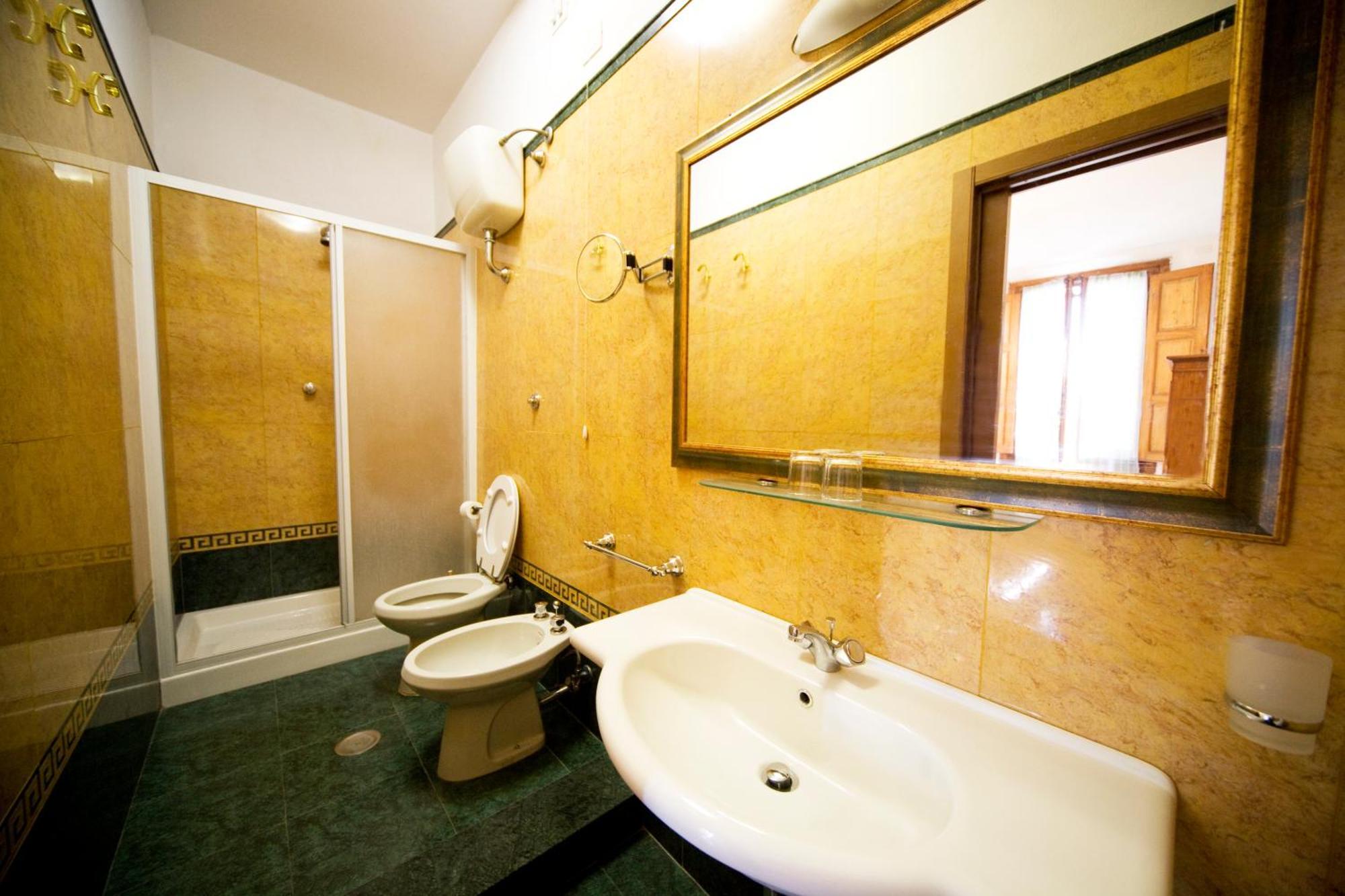 Hotel Merlini Florença Quarto foto